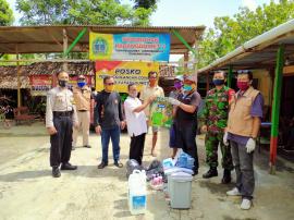 PENYERAHAN SARANA UNTUK PENANGGULANGAN COVID-19 DARI GUGUS TUGAS PENANGGULANGAN COVID-19  DESA  KARA